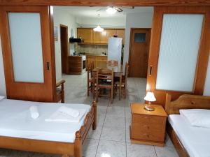 A kitchen or kitchenette at 85 sqm Apartments New Panorama ELECTRIC CAR ΦΩΡΤΗΣΗΣ STATION