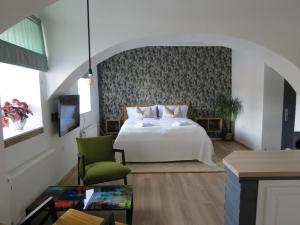 Krevet ili kreveti u jedinici u okviru objekta Apartmán Pod Synagogou