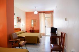 TV a/nebo společenská místnost v ubytování Hotel Central