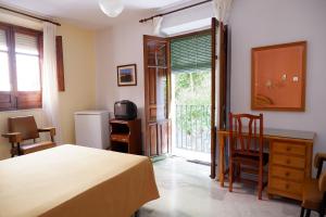 Postel nebo postele na pokoji v ubytování Hotel Central