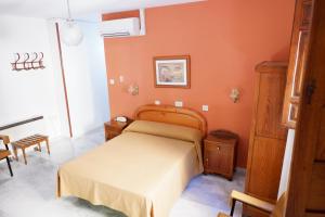 Postel nebo postele na pokoji v ubytování Hotel Central