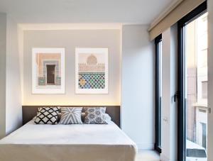 A bed or beds in a room at Broz Hostel
