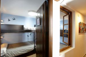 Postel nebo postele na pokoji v ubytování Oripando Hostel