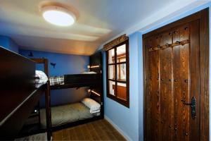Postel nebo postele na pokoji v ubytování Oripando Hostel