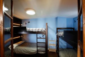Postel nebo postele na pokoji v ubytování Oripando Hostel