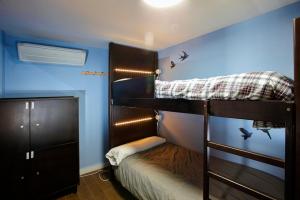 Postel nebo postele na pokoji v ubytování Oripando Hostel