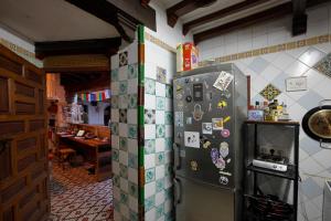 Kuchyň nebo kuchyňský kout v ubytování Oripando Hostel