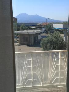 a view of a building from a balcony at La casa di paola in SantʼAntonio Abate