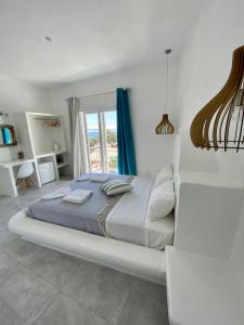 Letto o letti in una camera di Manios Suites