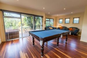 a living room with a pool table in it at Aqua Vista in Paynesville