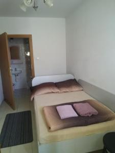 Postel nebo postele na pokoji v ubytování Hostel Malva