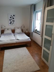Postel nebo postele na pokoji v ubytování Ferienwohnung Meyer