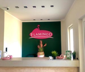 Certifikát, hodnocení, plakát nebo jiný dokument vystavený v ubytování Flamingo
