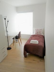Un pat sau paturi într-o cameră la Ana's Bed & Kitchen