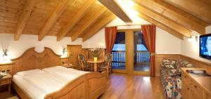 TV a/nebo společenská místnost v ubytování Wellness Hotel Gran Risa***S