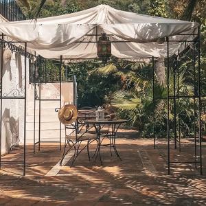 Vonkajšia záhrada v ubytovaní Jardines De La Reina Boutique Bed & Breakfast