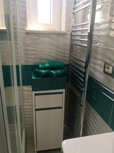 a bathroom with a shower and a toilet and a sink at Palinuro Casa Vacanza Melita in Palinuro +52 photos