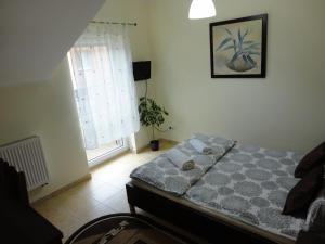 Łóżko lub łóżka w pokoju w obiekcie GRAND VILLA USTKA- Marmonoli