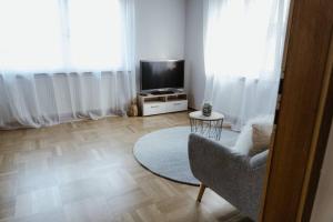 TV a/nebo společenská místnost v ubytování Ferienhaus Barbara