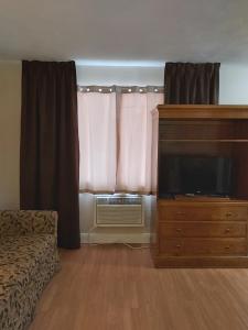 Postel nebo postele na pokoji v ubytování Seely's Motel