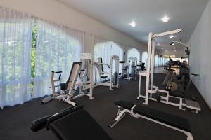 a gym with several tread machines in a room at Villa Bejar Tequesquitengo in Tequesquitengo
