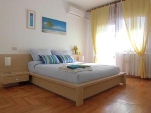 Postel nebo postele na pokoji v ubytování Solare B&B