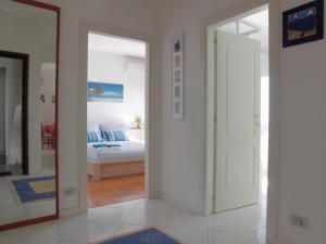 Postel nebo postele na pokoji v ubytování Solare B&B