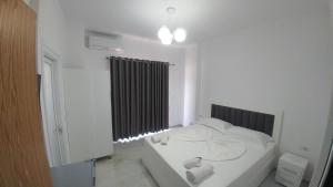 Postel nebo postele na pokoji v ubytování Hotel ZEKA