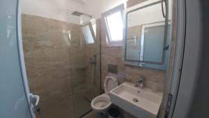 Koupelna v ubytování Hotel ZEKA