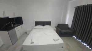 Postel nebo postele na pokoji v ubytování Hotel ZEKA
