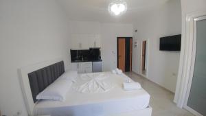 Postel nebo postele na pokoji v ubytování Hotel ZEKA