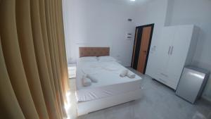 Postel nebo postele na pokoji v ubytování Hotel ZEKA