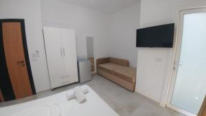 TV a/nebo společenská místnost v ubytování Hotel ZEKA