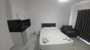 Postel nebo postele na pokoji v ubytování Hotel ZEKA