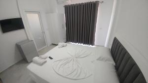 Postel nebo postele na pokoji v ubytování Hotel ZEKA