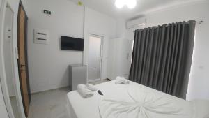 Postel nebo postele na pokoji v ubytování Hotel ZEKA