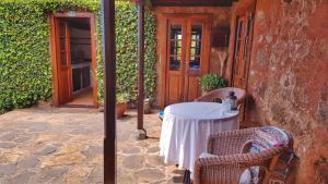 Un patio o zona al aire libre en Casa Palmera