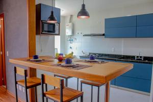 Virtuvė arba virtuvėlė apgyvendinimo įstaigoje Apartamento silencioso, perto de tudo e com uma vista maravilhosa