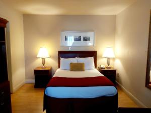Postel nebo postele na pokoji v ubytování Seely's Motel