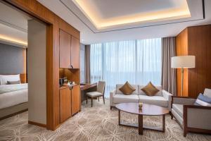 Ένα ή περισσότερα κρεβάτια σε δωμάτιο στο LOTTE Hotel Yangon