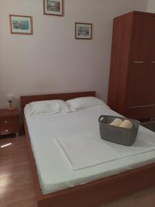 Postel nebo postele na pokoji v ubytování Pensiunea Caramell