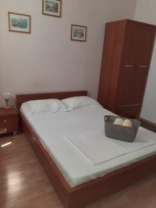 Postel nebo postele na pokoji v ubytování Pensiunea Caramell