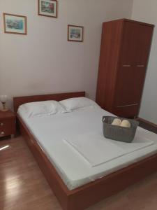 Postel nebo postele na pokoji v ubytování Pensiunea Caramell