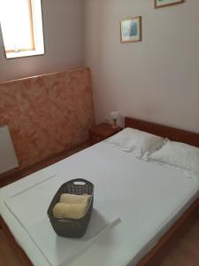 Postel nebo postele na pokoji v ubytování Pensiunea Caramell