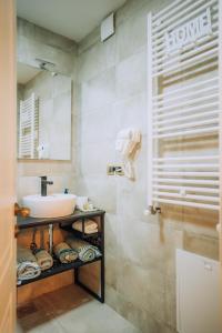 a bathroom with a sink and a shower at Villa Amfora in Ohrid +34 photos