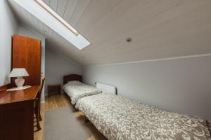 Postel nebo postele na pokoji v ubytování Strautu Lux Apartment