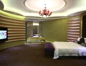 เตียงในห้องที่ All-Ur Boutique Motel - ChungLi Branch