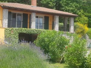 a house with a garden in front of it at Peace of mind N 3 in Poljane