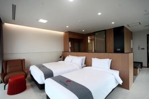 Postelja oz. postelje v sobi nastanitve Hotel Skypark DaejeonⅠ