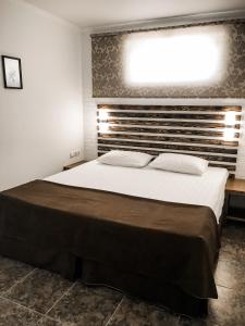 Cama o camas de una habitación en Mohito Guest House